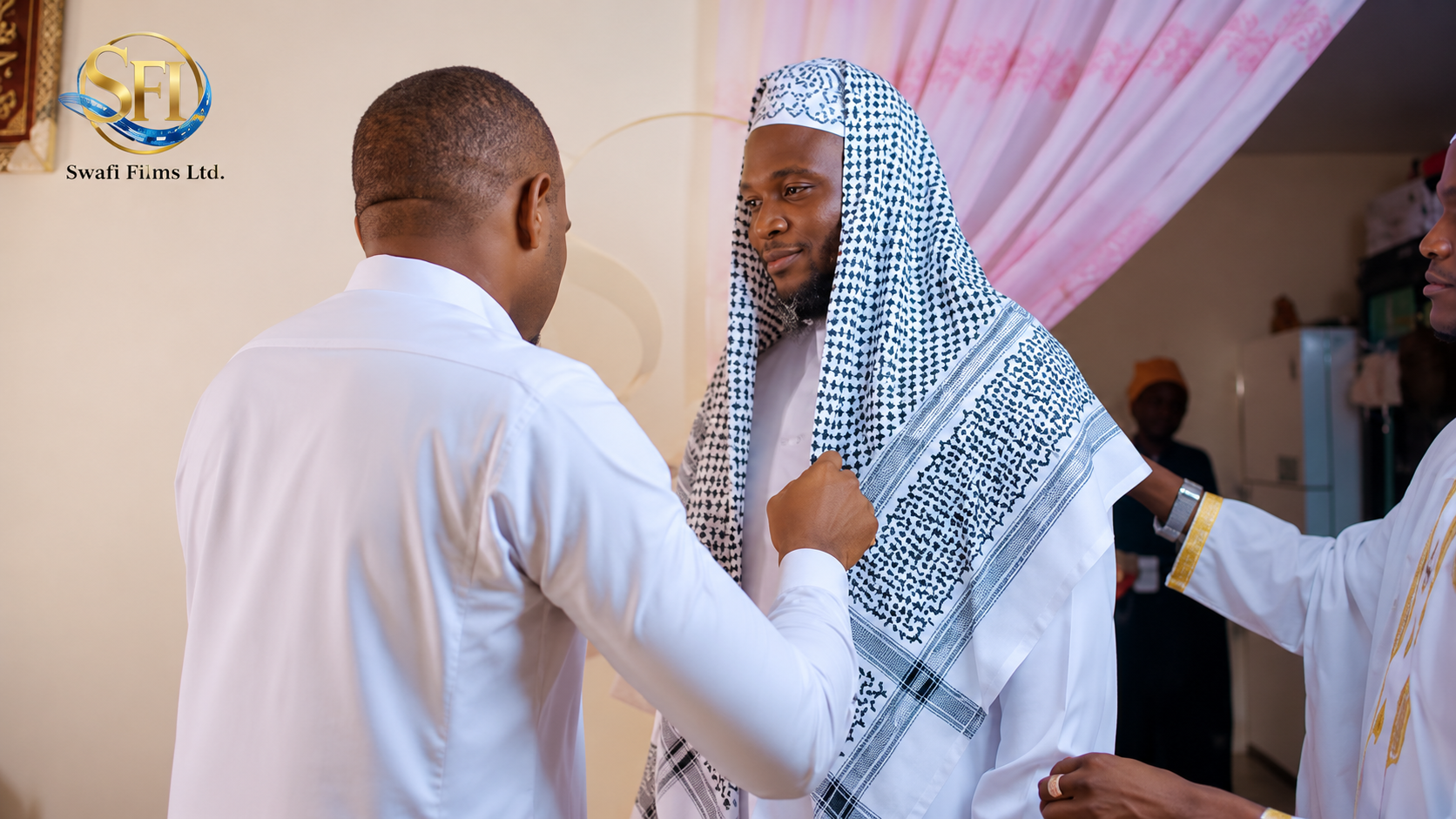 Men in traditional attire in a Swafi Films production